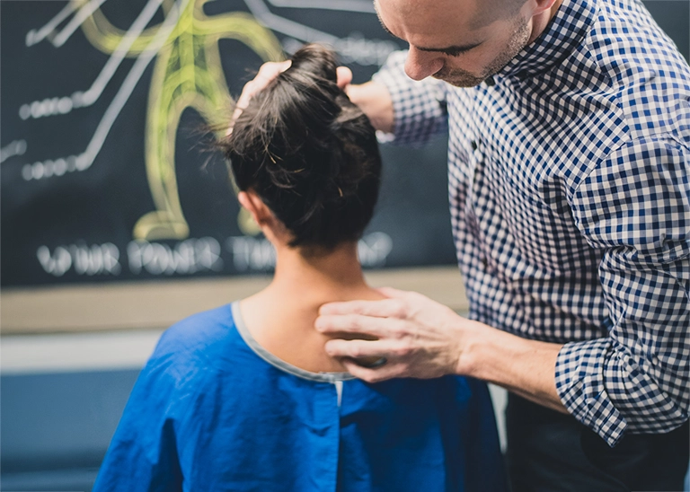 gonstead method - chiropractor motion palpitation The spine is assessed while moving