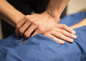Gonstead Method - static palpitation- chiropractor back adjustment