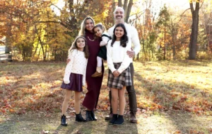 Who We Help - family portrait Dr mirandola with his wife an children- family chiropractor